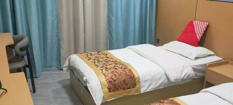 酒泉红彤彤宾馆(钟鼓楼汉唐美食街店)图片