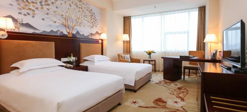 东阳花园大厦酒店(花园商业中心横店通用机场店)图片