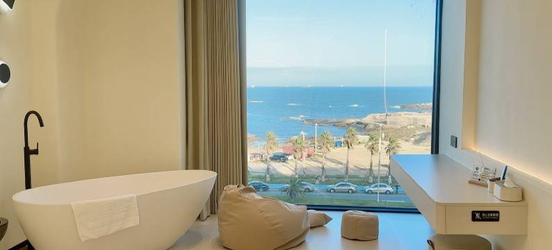 石狮•塔影汐岸｜TYXA｜多元风•设计师美宿(黄金海岸红塔湾店)图片