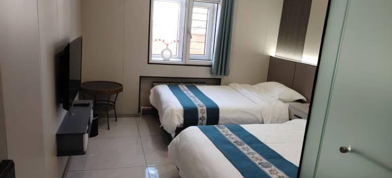 扎兰屯自然醒宾馆图片