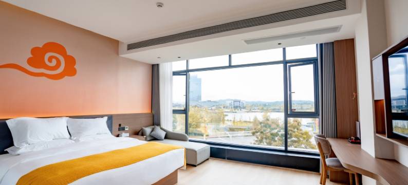 丽橙酒店(岳池火车站龙湖公园店)图片