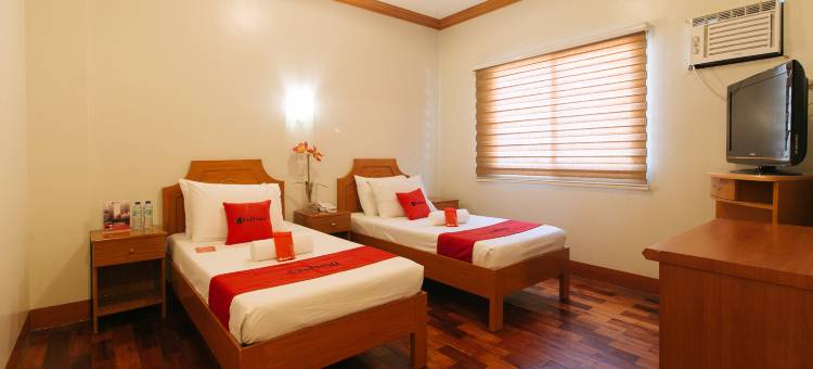红多兹高级酒店@赫罗那打拉尼克酒店(RedDoorz Premium @ Nick Hotel Gerona Tarlac)图片