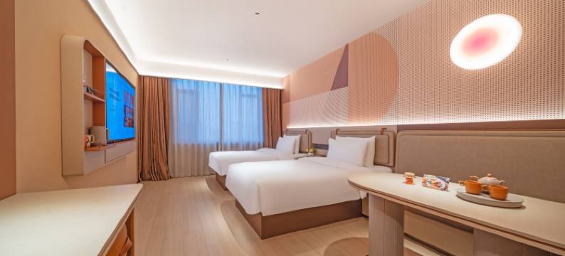 桔子酒店(延吉延边大学网红墙店)图片