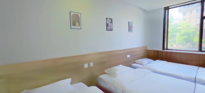 红豆杉宾馆(长白山北坡集散中心云顶市集店)图片