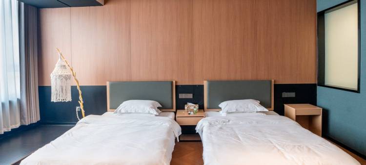 孔雀窝云墅酒店(唐山万达广场建国里商业街店)图片