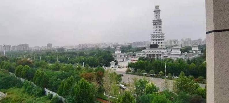 悦庭·楠舍观影民宿(天明财富广场文理学院店)图片