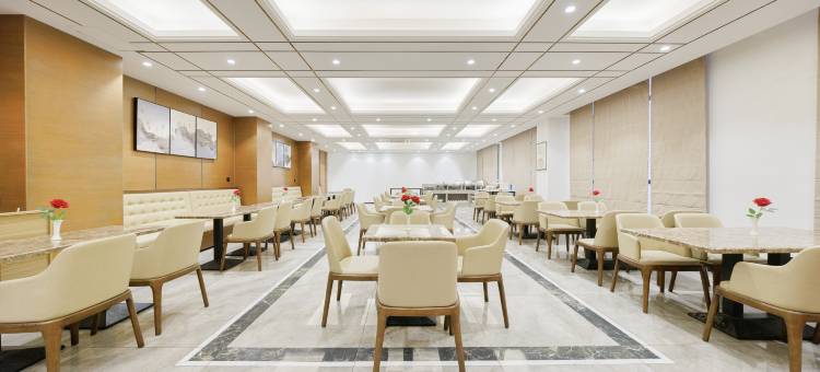 遇悦分时酒店(万宁高铁站华亚欢乐城店)图片