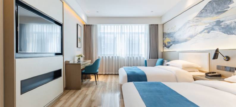 苹果淳源酒店(元一名城火车站店)图片