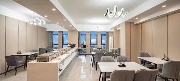 华美酒店(新乡市政府高铁东站店)图片