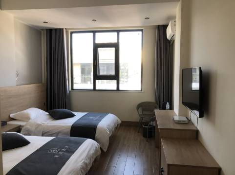 富源世佳民宿(竹园镇店)