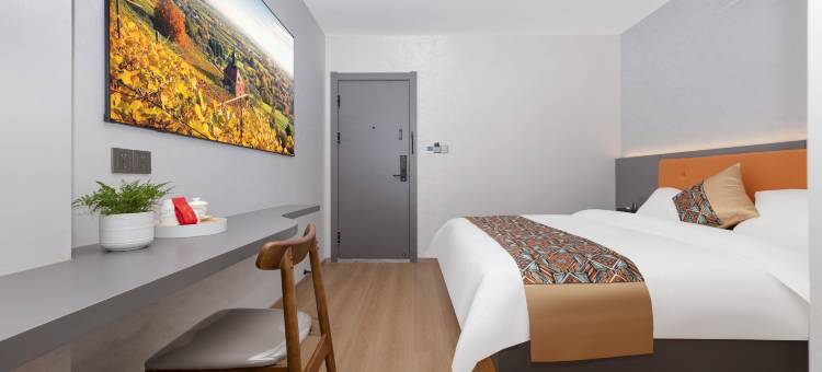 黔花之筑EconomyBusinessHotel兴业酒店(诏安关帝庙梅峰公园店)图片