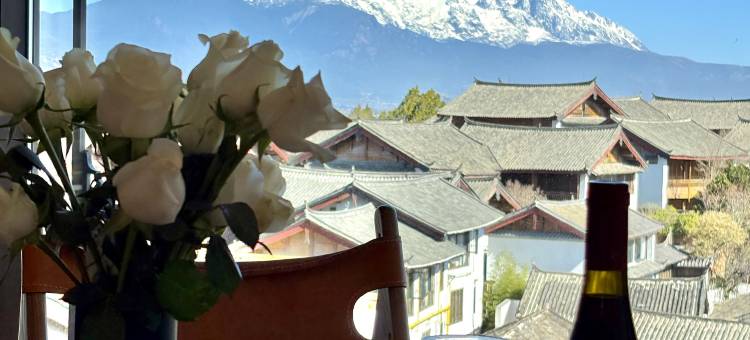 在山也·SANYEL日照金山观雪山古城全景美宿(丽江古城大水车店)图片