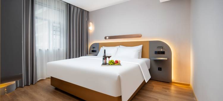 栖悦酒店(米公路沃尔玛民发广场店)图片