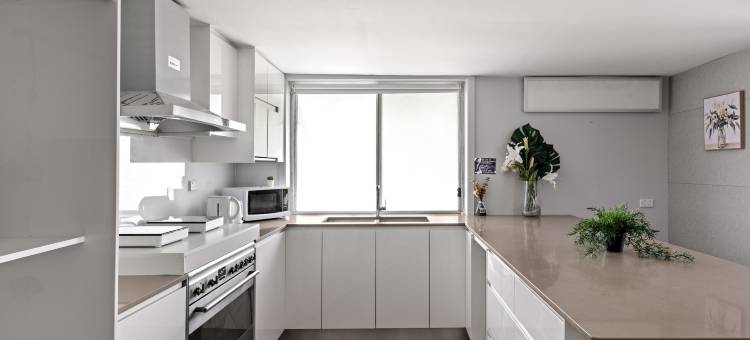 皮克赫斯特位置便利明亮简约客房家庭旅馆(Light & Simple Rooms in Convenient Peakhurst Location)图片