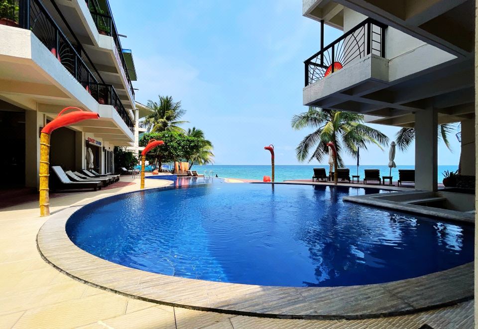 Sunset at Aninuan Beach Resort powered by Cocotel Hotel Overview