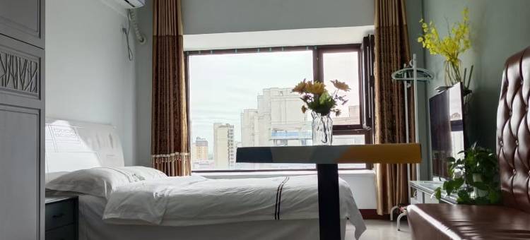 橙子民宿(美巢大厦店)图片