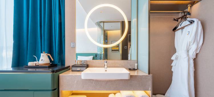 丽呈别院·玫宝酒店(石老人海水浴场体育中心店)图片