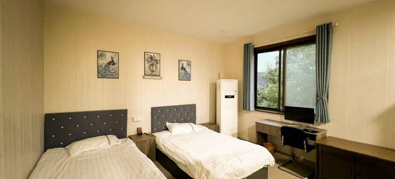 苏州玫瑰园商务宾馆(铜罗古镇店)图片