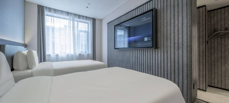 延吉百货大楼西市场轻居酒店图片