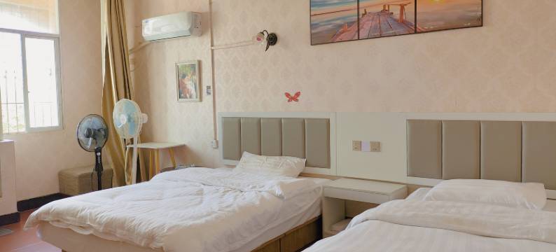 新港旅店(武汉纺织大学阳光校区江夏一中店)图片