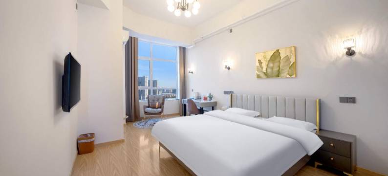 长春远大购物广场钜城华亿购物广场聚森民宿图片