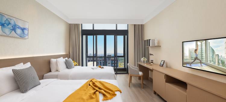 馨乐庭公寓酒店(广州黄埔宝能演艺中心店)图片