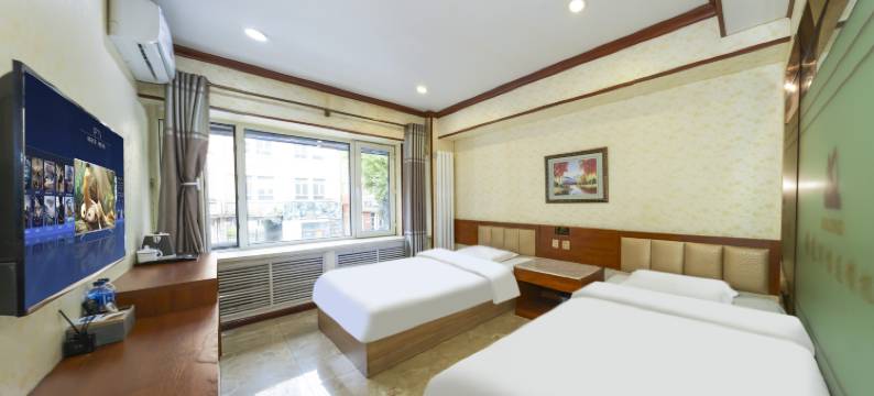 禧龙宾馆(哈尔滨火车站医大一院地铁站店)图片