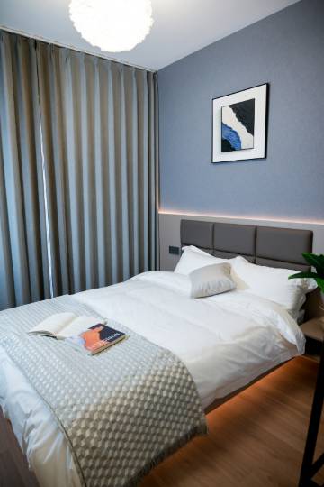 知樾民宿(肇庆恒大梦幻城绿地樾湖店)