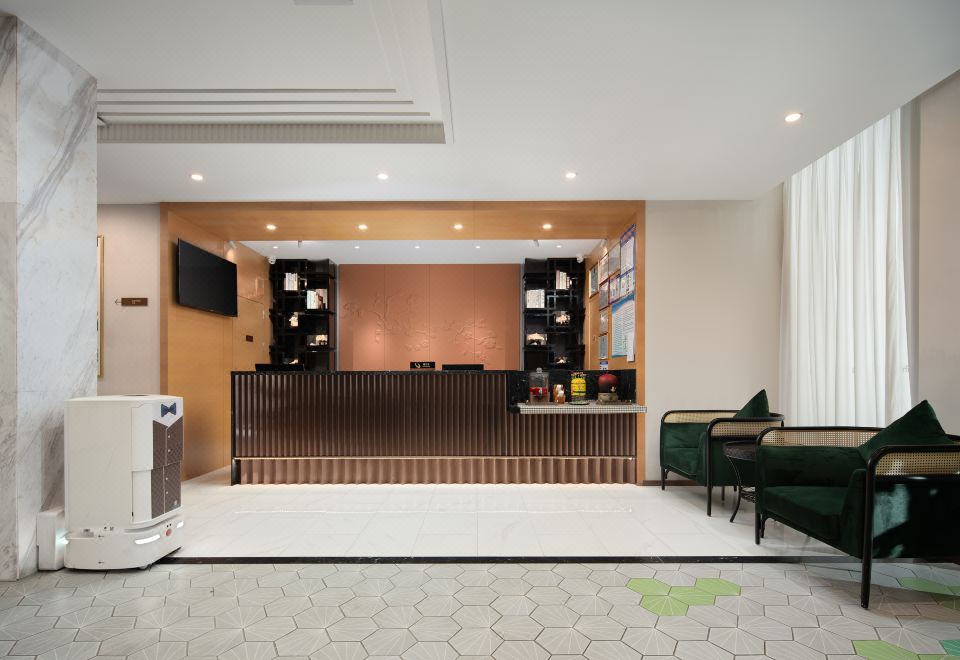 Metropolo Jinjiang Hotel (Haikou East High speed Railway Station, Normal University) Hotel Overview