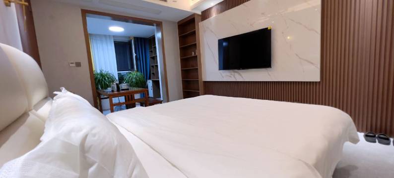 悦庭·楠舍观影民宿(天明财富广场文理学院店)图片