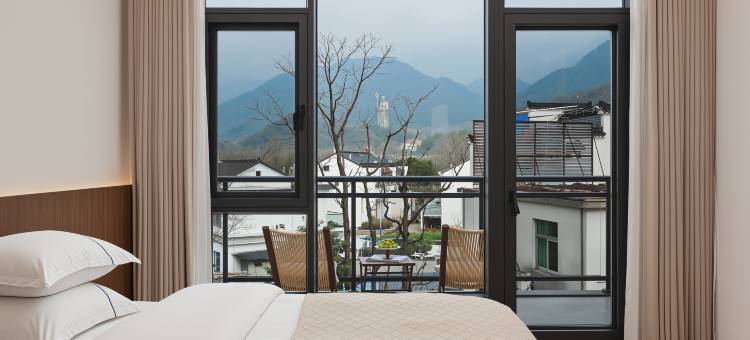 瑾愿·180°观山望佛沐禅心美宿(九华山大愿文化园店)图片