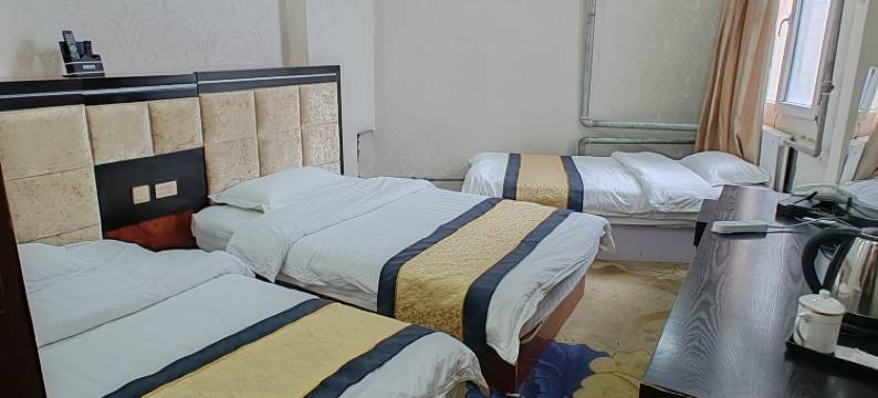 丁青琼宝宾馆图片