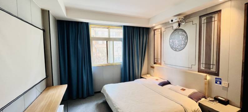 七禧轻居酒店(省体育中心店)图片