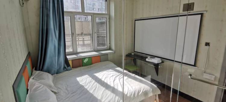 哈尔滨朗逸主题影咖宾馆图片