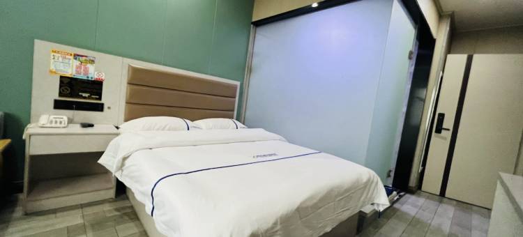 懿欣源快捷宾馆(乌鲁木齐北方钢铁物流园店)图片