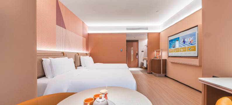 橘桔酒店(赣州于都国际服装城店)图片