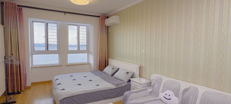 烟台石榴家海景公寓(养马岛店)图片