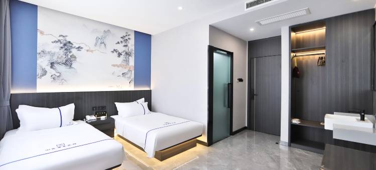 白城回家商务宾馆(火车站新华东大路店)图片