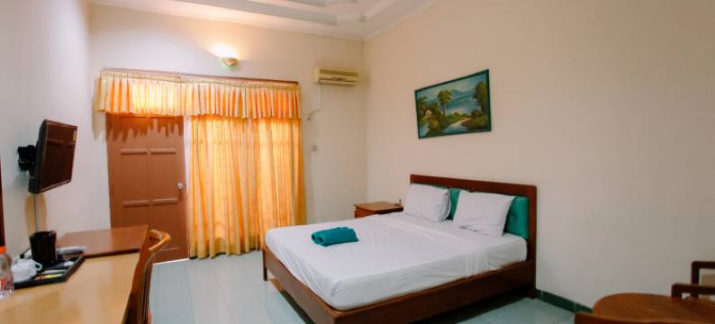 位于泰加尔萨里的2卧室-500平方米|带1个独立浴室(Dewi Ratih Hotel Batang)图片