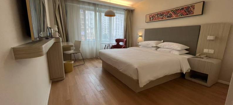 固镇浪漫旅程酒店(投资大厦店)图片