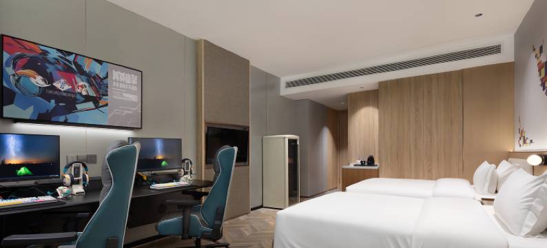 网鱼电竞酒店(德思勤商业广场店)图片