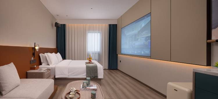 阜阳茉莉·月亮湾酒店(颍州里二里井夜市市中心店)图片