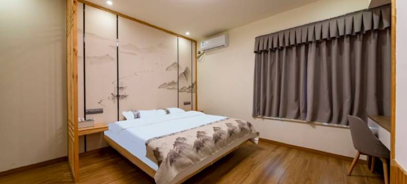 一宿酒店(乐山高铁站世豪广场店)图片