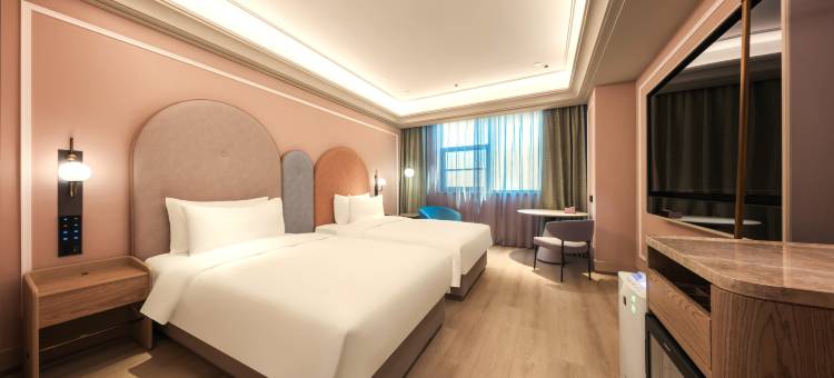 信阳宝鹏广场美居酒店图片