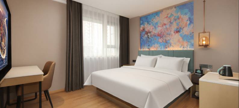 白玉兰酒店(洛阳龙门高铁站泉舜购物中心店)图片