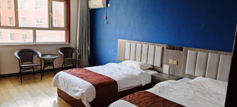 麦盖提川缘聚宾馆(卡龙情中央广场店)图片