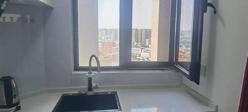 憨豆酒店公寓(郑州正弘数码公寓店)图片