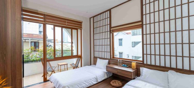 Phòng hai giường phong cách tối giản tại Su'e Homestay Huế