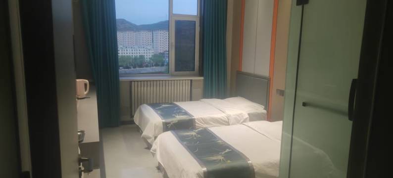 镇原怡心怡缘商务宾馆图片