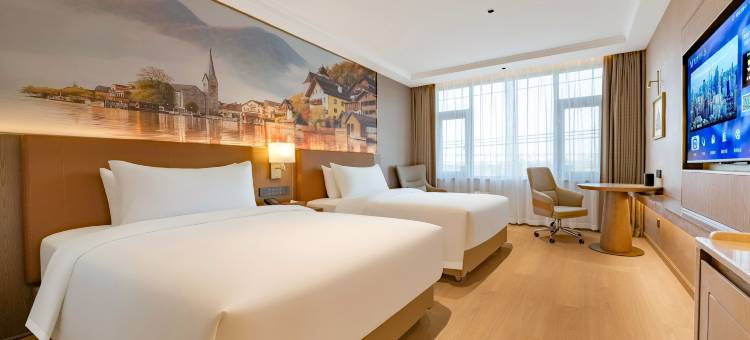 维也纳酒店(彭山青龙镇店)图片